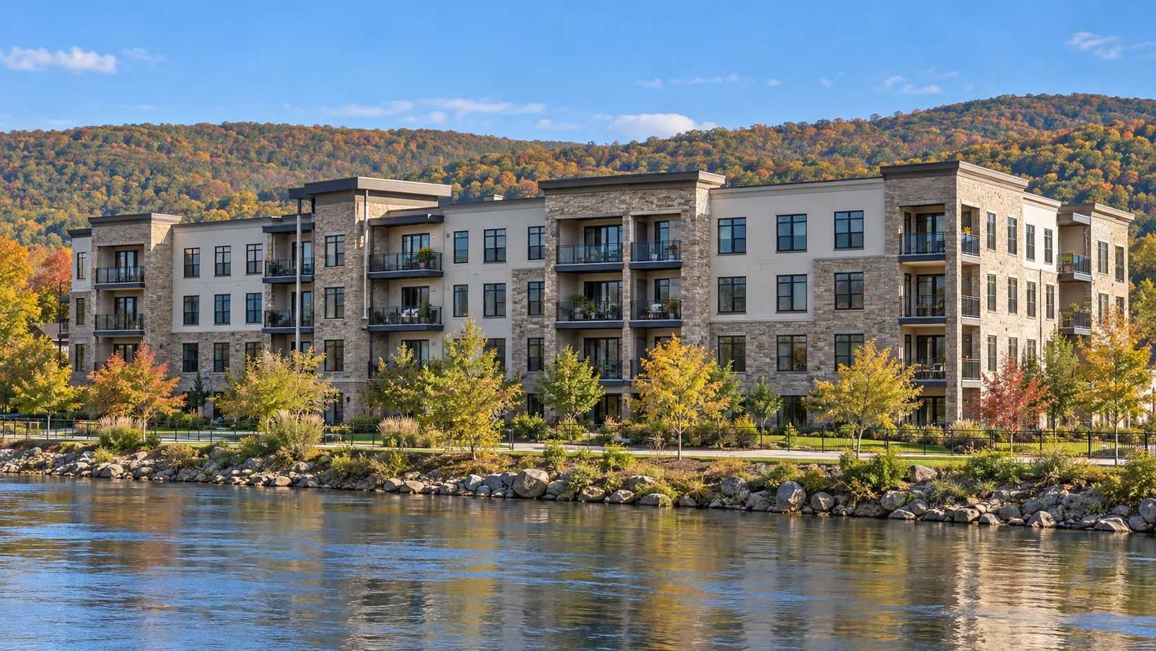 Illustrative apartment building alongside a river